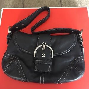 Coach black leather soho buckle flap handbag